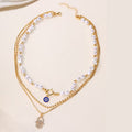 Multi-Layer Women’s Necklace – Western-Style Alloy with Rhinestones, Pearl Eye &amp; Palm Pendants